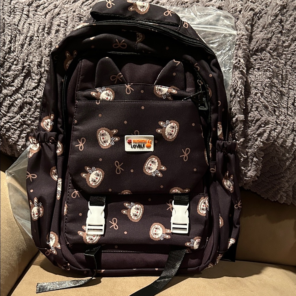 Stylish Black Patterned Backpack - image 1